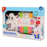 cow-keyboard-learning-piano